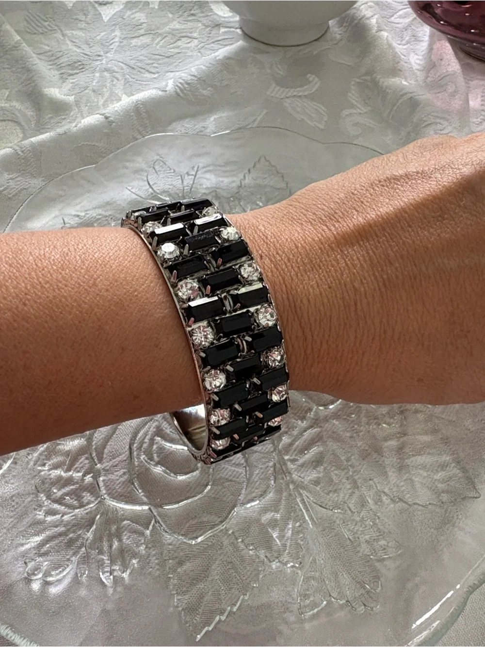 Elegant Silver Bangle Bracelet with Black and Clear Rhinestones.